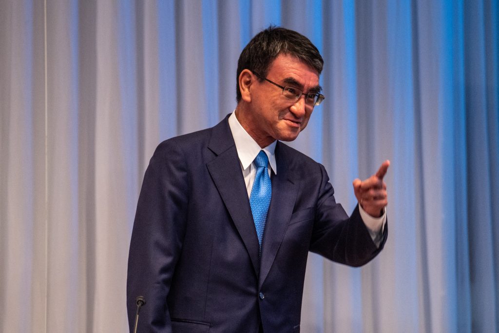 Candidate for the presidential election of the ruling Liberal Democratic Party KONO Taro, cabinet minister in charge of vaccinations, attends a debate organized by Liberal Democratic Party, Youth Bureau, Women's Bureau at Liberal Democratic Party headquarters in Tokyo on September 20, 2021. (AFP)