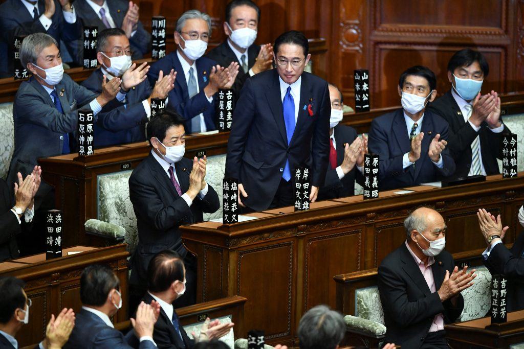 The LDP is on track to win 233 seats in the 465-seat Lower House, though down from its pre-election strength of 276 seats. (AFP)