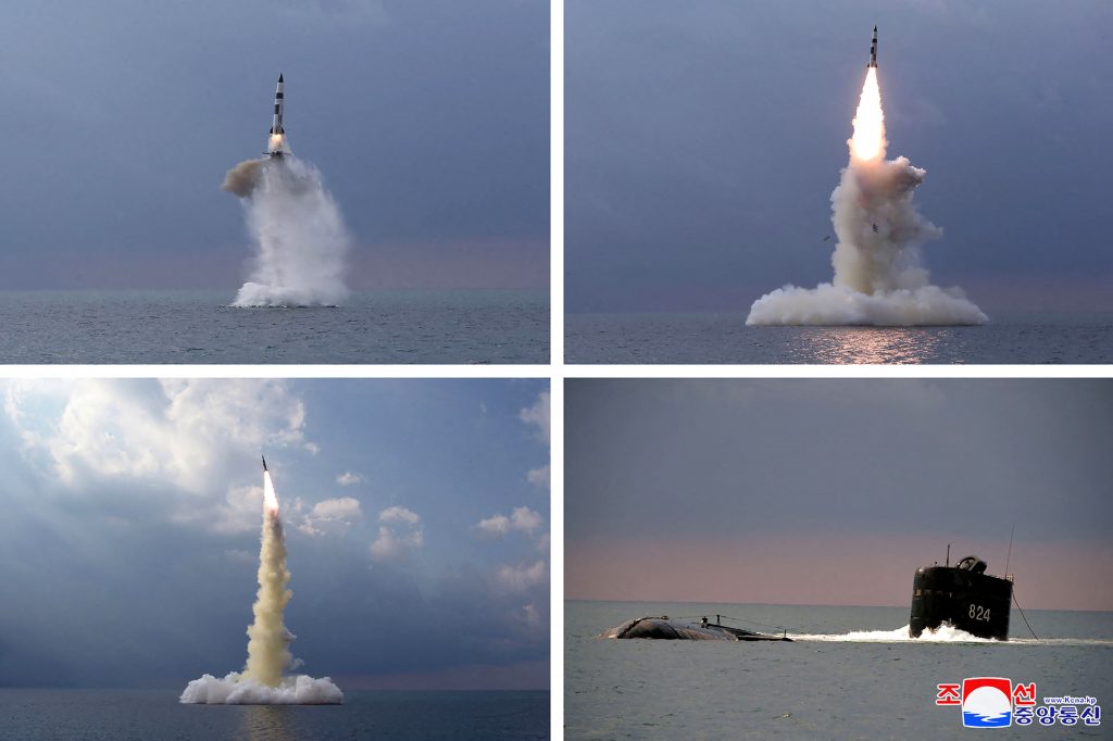 This combination of pictures taken on October 19, 2021 and released from North Korea's official Korean Central News Agency (KCNA) on October 20, 2021 shows test fire of a new type submarine-launched ballistic missile in an undisclosed location in North Korea. (AFP)