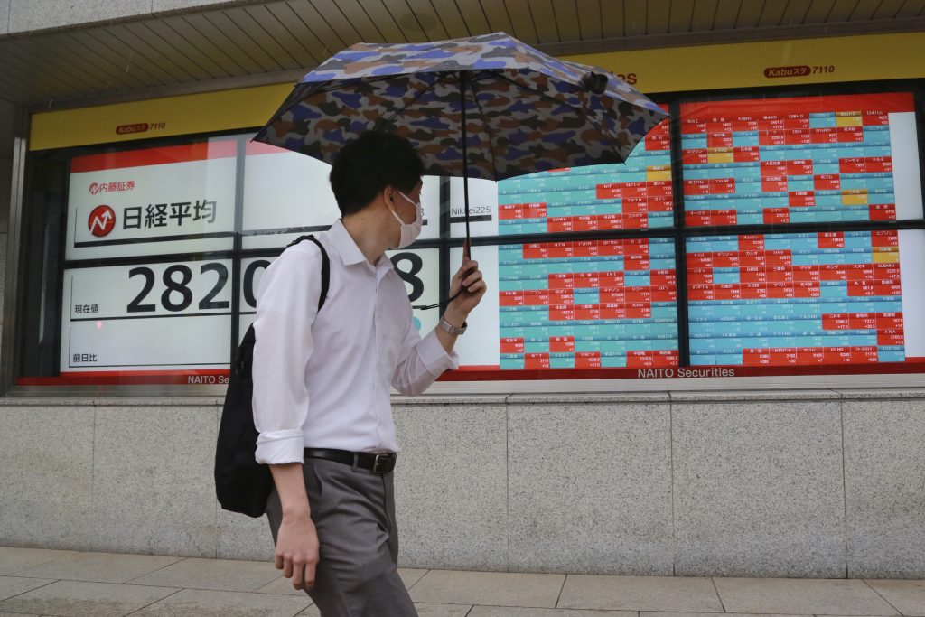 The benchmark Nikkei 225 index lost 0.32 percent, or 90.33 points, to 28,140.28. (File photo/AP)