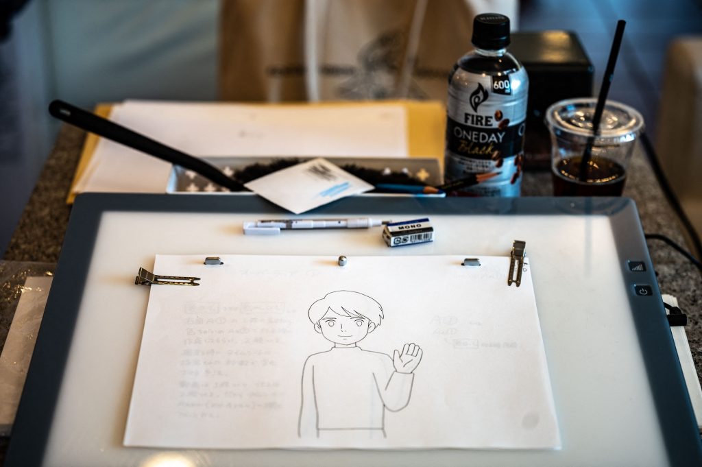 This picture taken on June 17, 2021 shows a student desk at the anime school Sasayuri in Tokyo. Japan is facing a shortage of skilled animators, in part because most face years toiling in low-paying jobs to learn the ropes, meaning much of the painstaking frame-by-frame drawing work is outsourced overseas. (AFP)