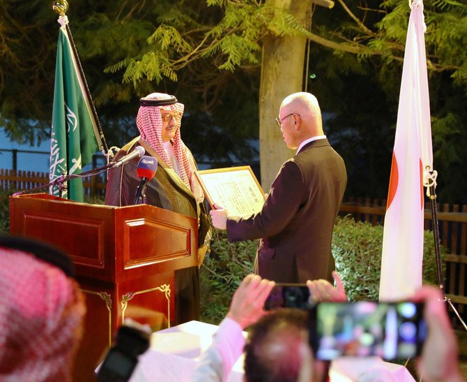 Prince Abdullah bin Faisal bin Turki Al-Saud accepted the commendation from Japanese Ambassador IWAI Fumio in Riyadh on Thursday. (AN photo by Saleh Al-Ghanam)