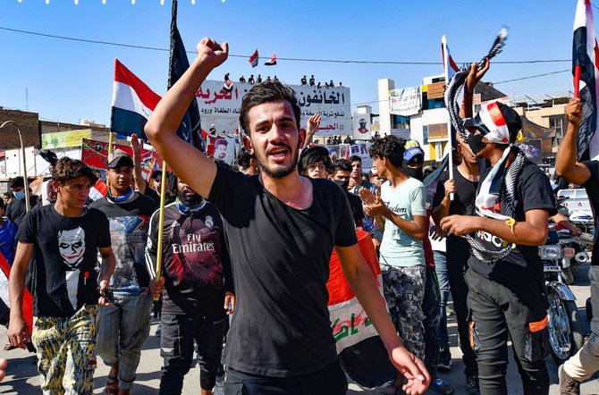 As election day unfolds Sunday, many young Iraqis still feel alienated from the political process and skeptical about meaningful change happening via the ballot box. (AFP/File Photo)