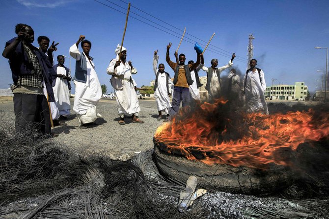 Members of the Beja ethnic group demonstrate in Sudan's northeastern Red Sea coastal city of Suakin (Sawakin) on Oct. 9, 2021, against the Juba Peace Agreement, signed in October 2020 between the government and rebel groups. (Ashraf Shazly / AFP)