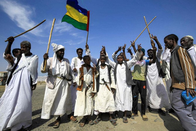 Members of the Beja ethnic group demonstrate in Sudan's northeastern Red Sea coastal city of Suakin (Sawakin) on Oct. 9, 2021, against the Juba Peace Agreement, signed in October 2020 between the government and rebel groups. (Ashraf Shazly / AFP)