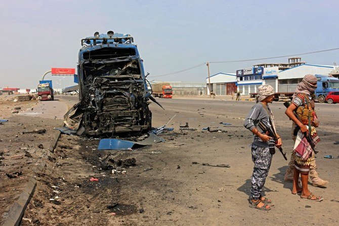 Fighters from the separatist Southern Transitional Council gather at the site of a reported car bomb. (File/AFP)