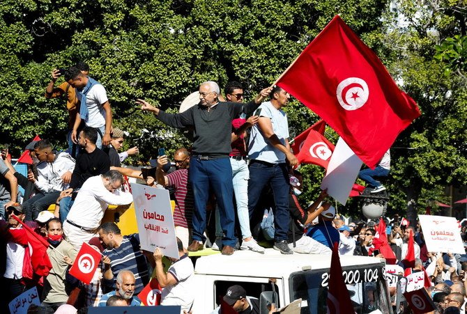 The growing number of protesters on each side raises the possibility of Tunisia’s political divisions spiraling into street confrontations between the two camps. (Reuters)
