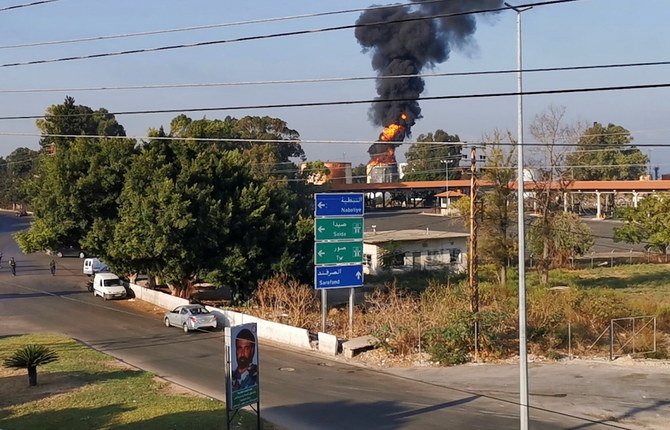 Smoke billows from a fire at the Zahrani oil facility in southern Lebanon on Oct. 11, 2021. (Reuters)