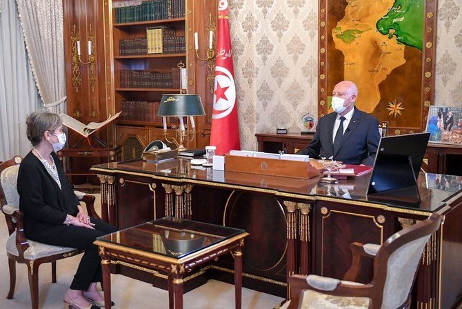Tunisian President Kais Saied, right, meets Najla Bouden, who was named as the country’s first ever female prime minister. (Tunisian Presidency via AFP)