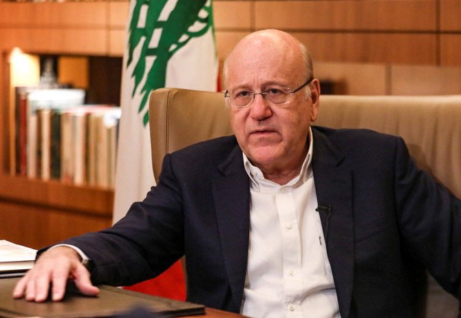 Lebanese Prime Minister Najib Mikati speaks during an interview with Reuters at the government palace in Beirut, Lebanon October 14, 2021. (Reuters)