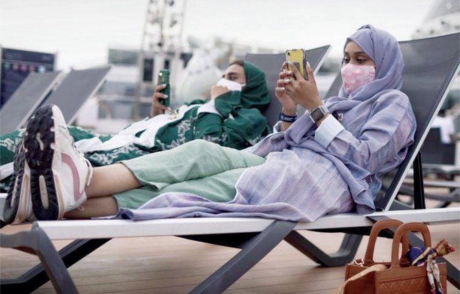 Face masks will no longer be mandatory in outdoor settings, except for certain locations including the Grand Mosque and the Prophet’s Mosque. (Reuters)