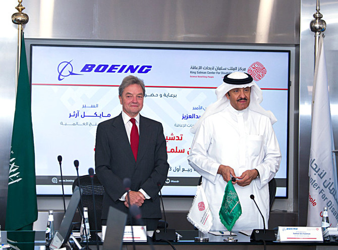Prince Sultan bin Salman, chairman of the board of trustees KSCDR, with Sir Michael Arthur, president of Boeing International, at the launch of the Prince Sultan bin Salman Program for Education and Awareness for individuals and families.