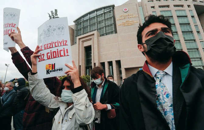 Activists demand the release of philanthropist Osman Kavala. He has been kept behind bars for four years ‘for attempting to overthrow the Turkish government.’ (Reuters/File)