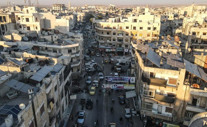 This aerial view shows solar panels on the rooftops of buildings in the town of Dana, east of the Turkish-Syrian border in the northwestern Syrian Idlib province, on June 10, 2021. (File/AFP)