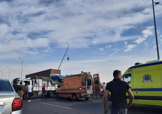 A head-on vehicle collision Wednesday left at least 19 people dead and one other injured just outside Cairo. (Al-Ahram)
