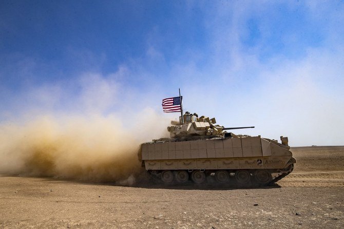 US soldiers patrol in the Syrian village of Jawadiyah, in the northeastern Hasakeh province in August. (AFP/File)