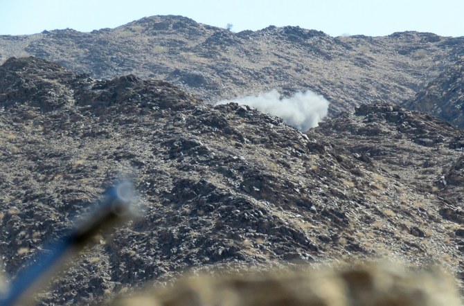 Smoke billows at the Juba frontline in Yemen’s northeastern province of Marib, on October 24, 2021. (AFP)