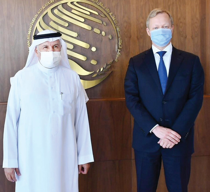 KSRelief chief Abdullah Al-Rabeeah and EU special representative Sven Koopmans pose for a photo-op in Riyadh on Thursday. (SPA)
