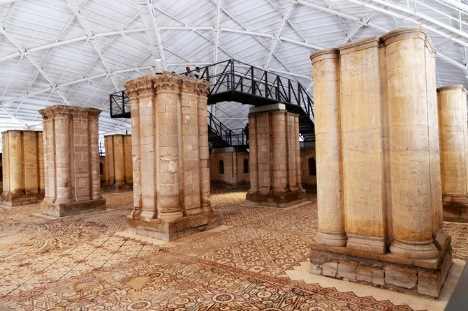 Visitors roam the site of a 7th century, 827 square meter mosaic. (AP)