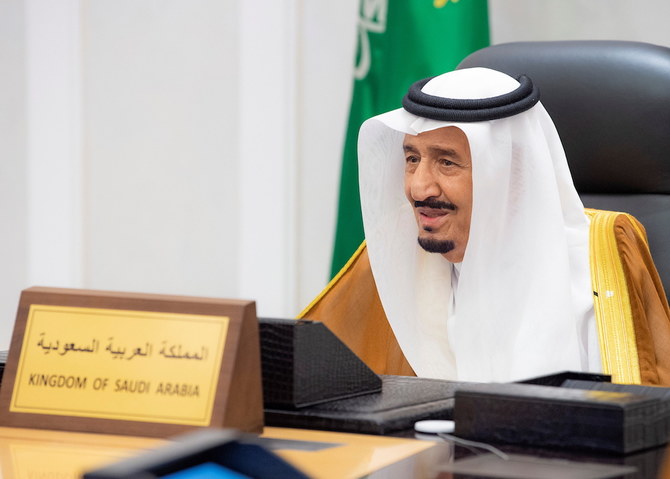 Saudi Arabia’s King Salman gives a virtual speech during the G20 leaders summit, held in Rome, Italy, from Riyadh. (Saudi Royal Court via Reuters)