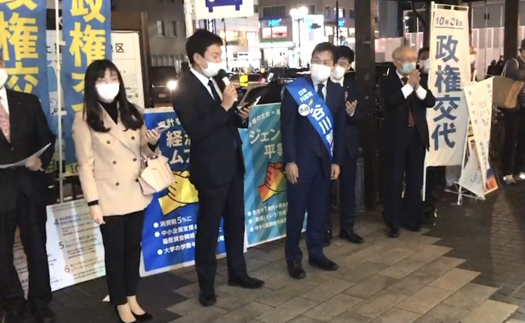 Japanese Communist Party election candidate Tomoyuki Tanigawa, who is running for a House of Representatives seat in Tokyo, received support from Rie Saito, an author and former nightclub worker. (ANJP Photo)