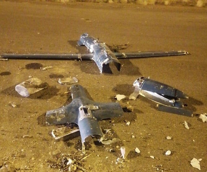 Debris from Houthi drones destroyed by coalition air defenses scattered over the airport in Jazan. (SPA)
