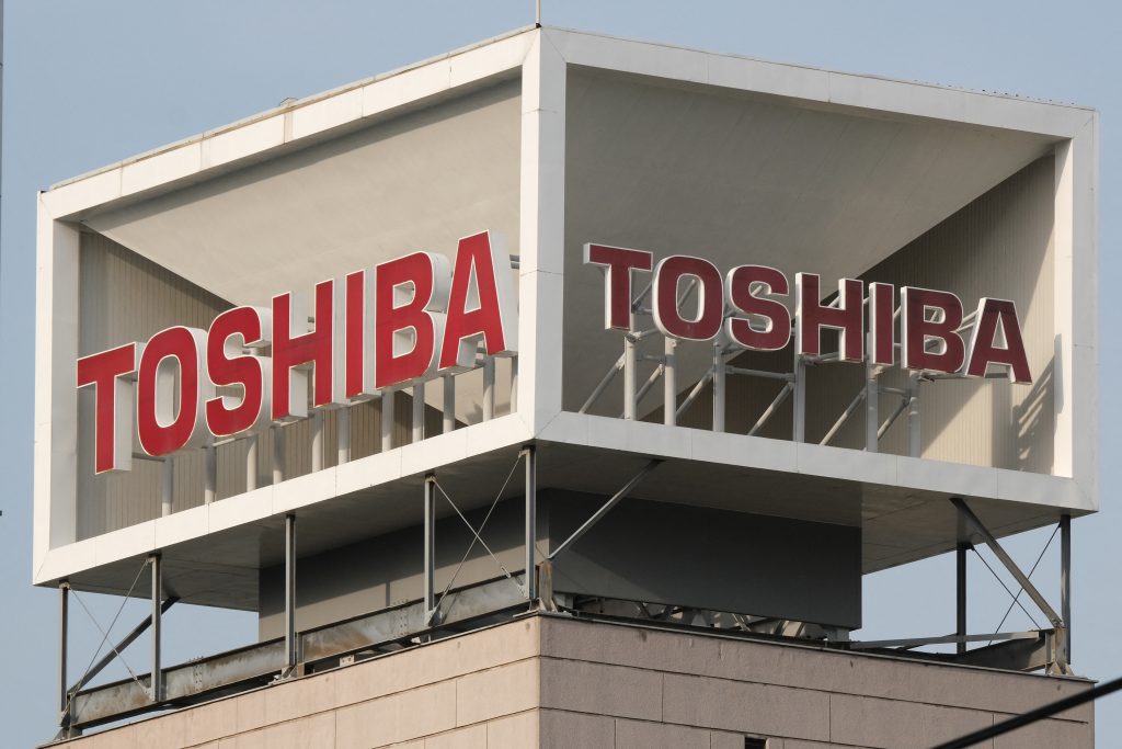 The logo of Japan's Toshiba is displayed at the company's headquarters in Tokyo on May 14, 2021 (AFP)