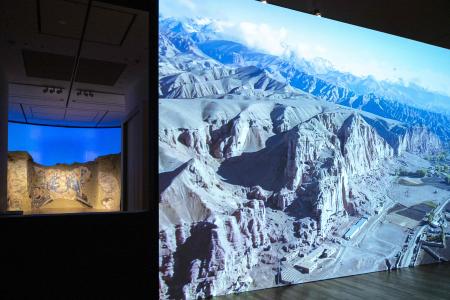 This photo taken on October 7, 2021 shows a replica of a cave painting of a blue Bodhisattva, part of artefacts destroyed by the Taliban in 2001, displayed at the Tokyo University of the Arts in Tokyo. (AFP)