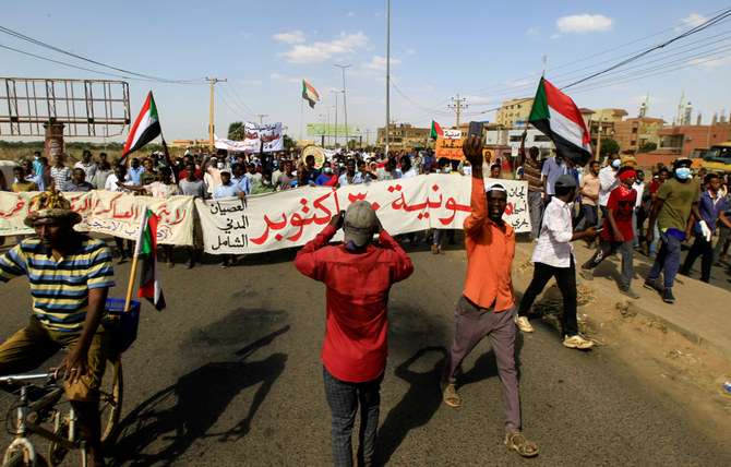 Sudanese anti-coup protesters on Sunday manned barricades in Khartoum a day after a deadly crackdown on mass rallies. (Reuters)