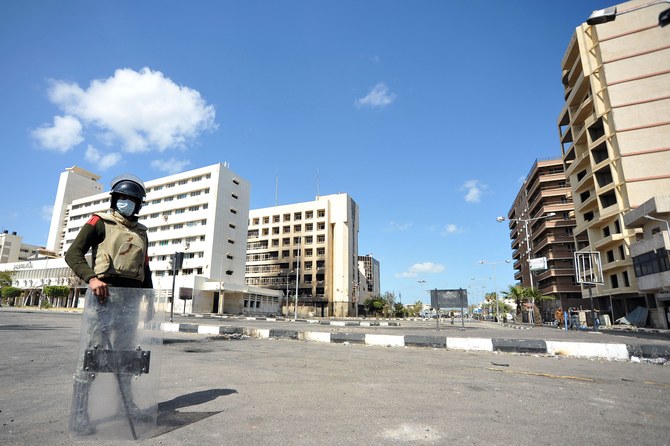 An Egyptian riot police man stands guard in a street in the Egyptian city of Port Said. (AFP)