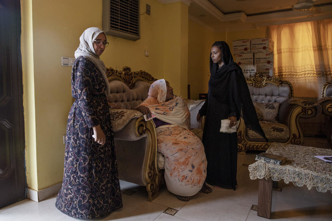 Mahasen Abdullah Abuelgasim, mother of slain 20-year-old Mohammed Abdel Sallam, weeps as she remembers her son at her home in Khartoum on Thursday. (AP)
