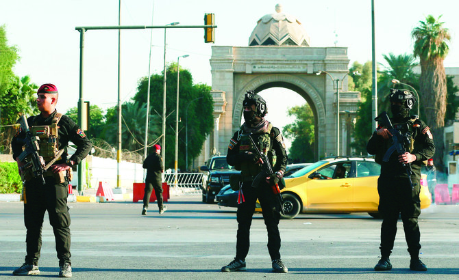 Security forces close the heavily fortified Green Zone during a protest on Saturday outside the Green Zone in Baghdad, following Friday’s deadly scuffles. (AP)