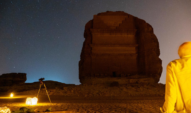 The Al-Farid tomb stands against a blanket of stars, as the visitors gather for stargazing. (AN photo by Huda Bashatah)