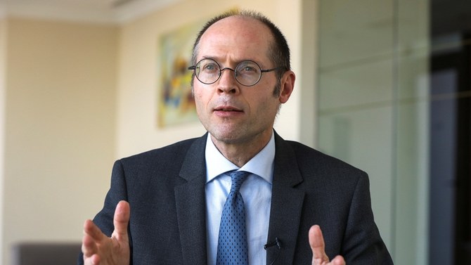 Olivier De Schutter, UN special rapporteur on extreme poverty and human rights gestures during an interview with Reuters, in Beirut on Thursday. (Reuters)