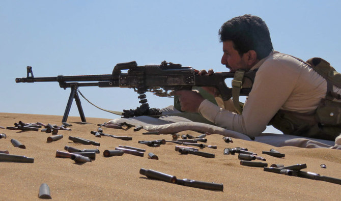 A Yemeni pro-government fighter is pictured during fighting with Huthi rebels on the south frontline of Marib on November 10, 2021. (AFP)