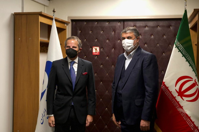 IAEA Director General Rafael Grossi meets with head of Iran's Atomic Energy Organization Mohammad Eslami, in Tehran, Iran, November 23, 2021. (ISNA/WANA via Reuters)