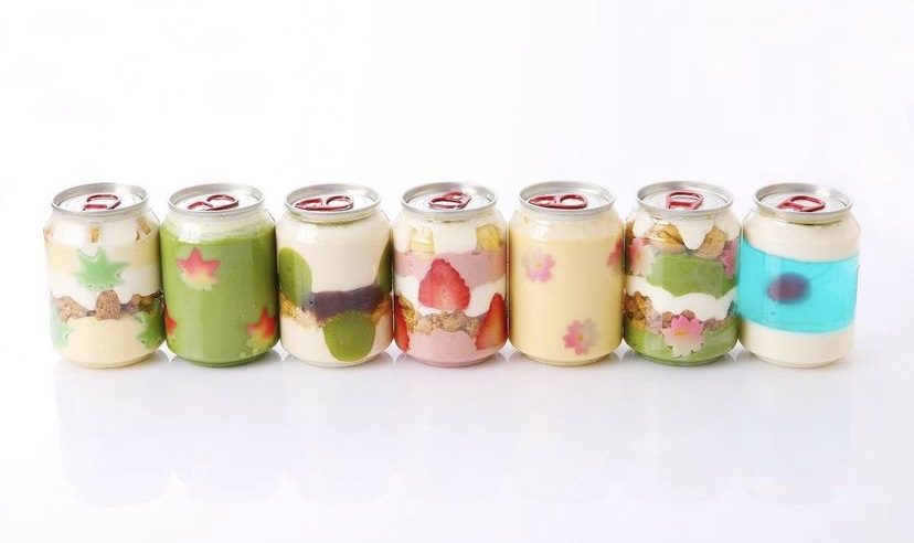 The patisserie is selling these cake cans in seven different types which include Blue Soda, Fromage, Cream Puffs, and Purin. (Patisserie Rakkansha/ Instagram)
