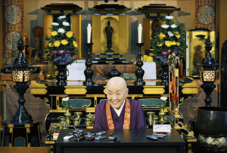 Japanese Buddhist nun and author Jakucho Setouchi speaks during an interview in Kyoto, Japan, April 8, 2015. (AP)