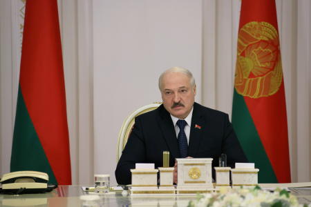 Belarusian President Alexander Lukashenko chairs a meeting, dedicated to the migrant crisis on the Belarusian-Polish border, in Minsk, Belarus, November 16, 2021. (Reuters)
