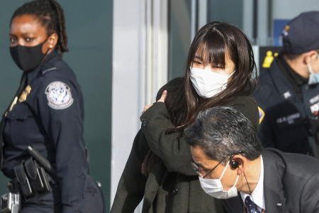 Mako Komuro, former Japan's Princess Mako and the eldest daughter of Crown Prince Akishino and Crown Princess Kiko, arrives with her husband Kei from Tokyo to start their new life in the US at JFK International airport in New York, U.S., November 14, 2021. (Reuters)