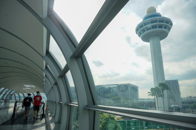 Singapore swiftly joined Britain in imposing a travel ban, with the country’s health ministry saying it would restrict arrivals from South Africa and countries nearby as a precaution. (AFP)