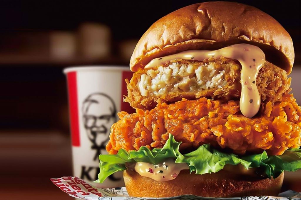 The Chicken Fillet and Menchikatsu Sandwich is made using two types of chicken—a menchi-katsu as well as seasoned fried chicken fillet.   (KFC Holding)