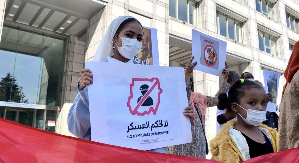 Demonstrators gathered outside the United Nations University in Tokyo. (ANJ Photo)