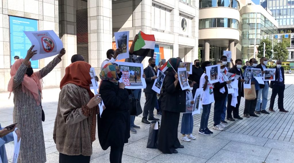 Demonstrators gathered outside the United Nations University in Tokyo. (ANJ Photo)