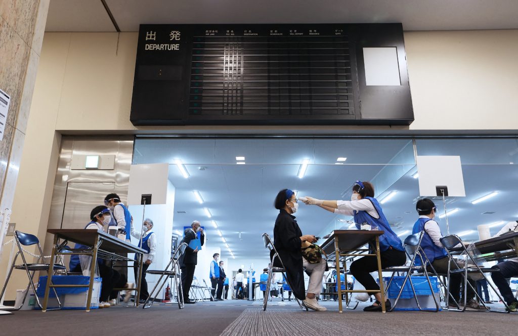 This picture shows the venue for mass inoculation of the new coronavirus vaccine at a terminal building of the prefectural-run Nagoya Airport in the town of Toyoyama, Aichi prefecture. (AFP)