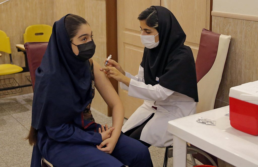 Japan will donate a further 700,000 shots of the vaccine to Iran via the COVAX program. (AFP)