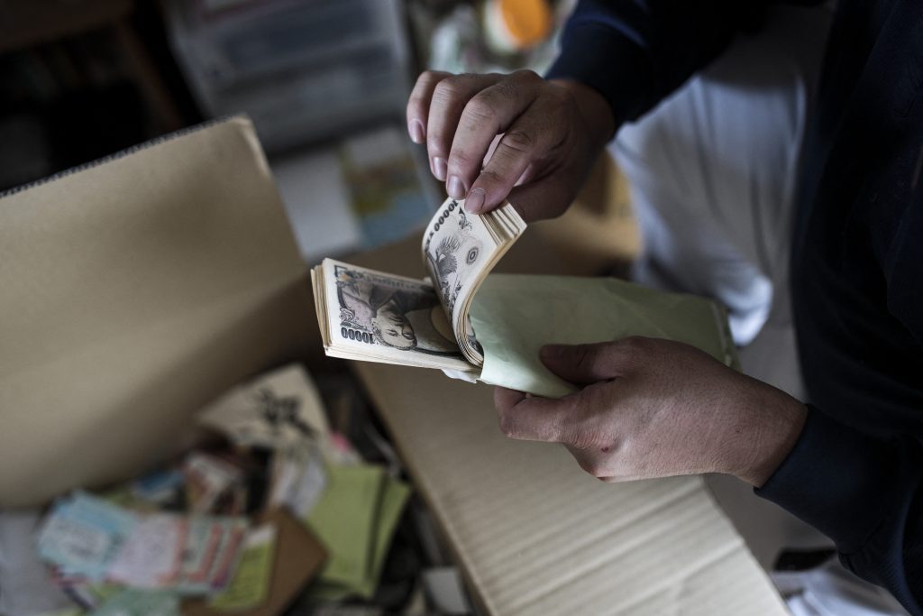 The amount of bank notes in circulation kept rising though cashless payments are spreading. (AFP)