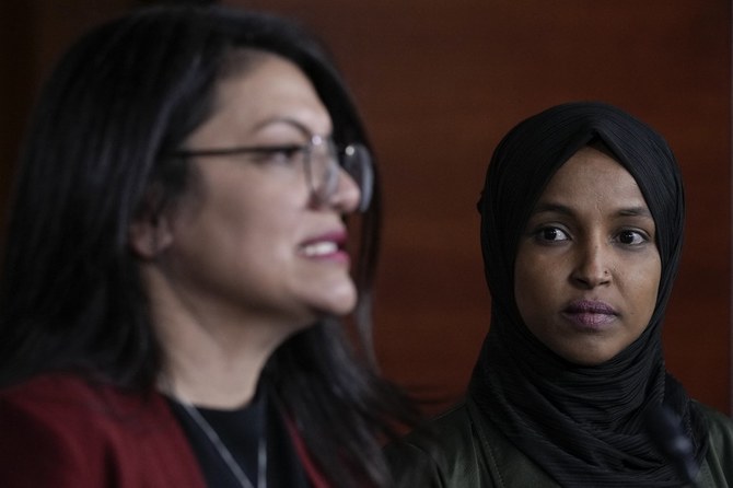 Representatives Rashida Tlaib, left, and Ilhan Omar both voted against the Iron Dome money. (AFP)