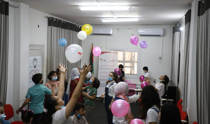 Specialists in the besieged Gaza Strip are mixing psychiatry and music in therapy sessions designed to improve positivity among the Palestinian enclave’s war-weary population. (Supplied)