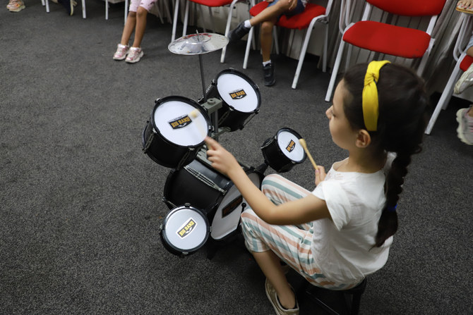 Specialists in the besieged Gaza Strip are mixing psychiatry and music in therapy sessions designed to improve positivity among the Palestinian enclave’s war-weary population. (Supplied)